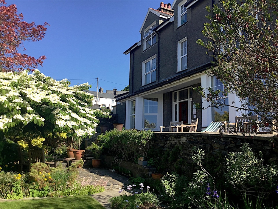 Front entrance of Wenallt Guest House seen from the garden on a sunny day in April