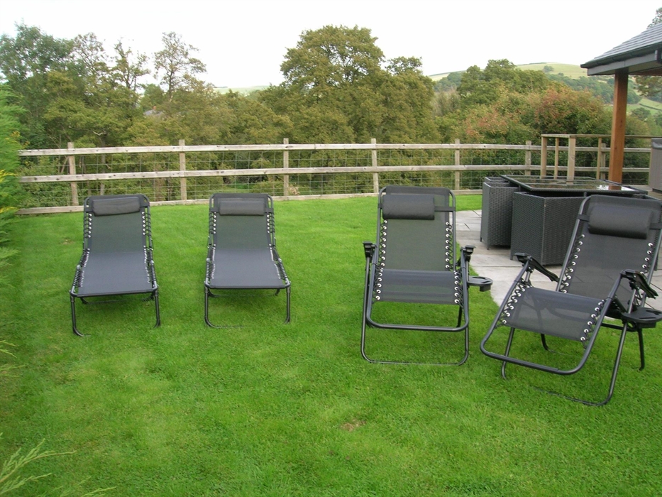 Garden loungers at woodland Lodge.
