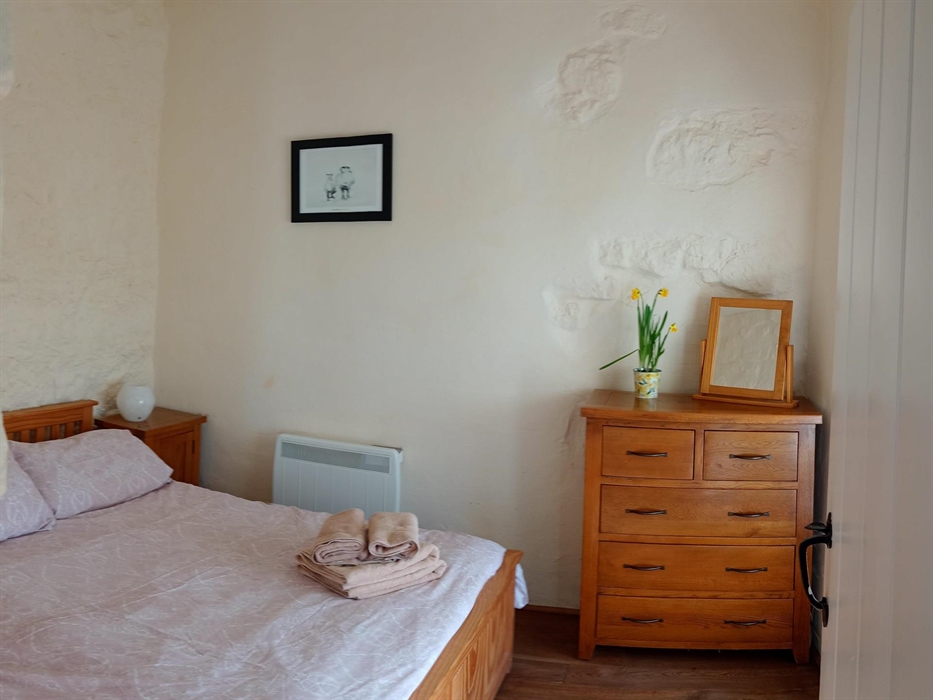 Stone features retained. Enjoy the spectacular views from the bedroom