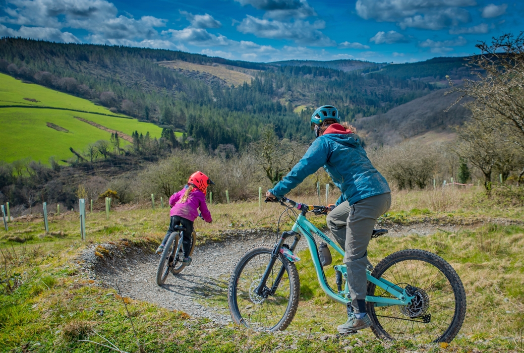 A young rider and her mam enjoying the trails together.
