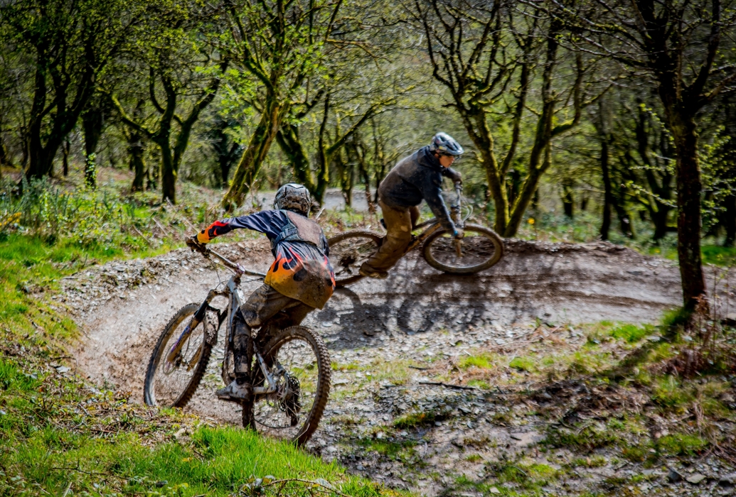 Two teenage riders shredding in the sunshine