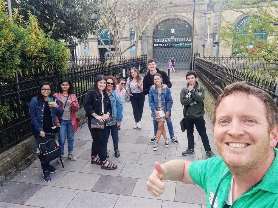 Cardiff Dark Side Tour outside Cardiff Market and St. John the Baptist Church in central Cardiff.