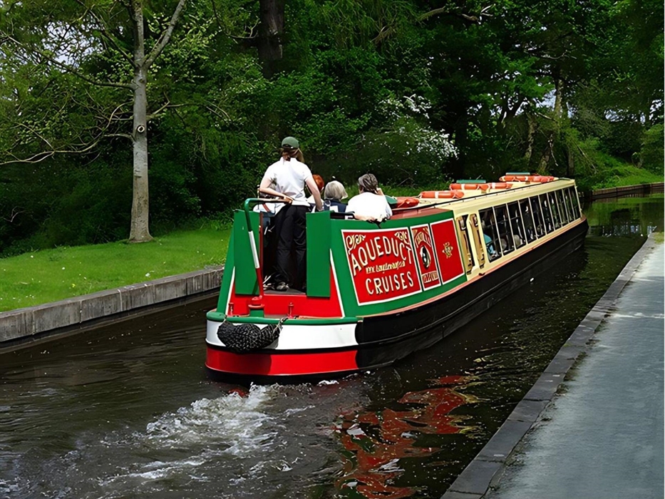 Llangollen Wharf's Thomas Telford canal boat as it embarks on its journey through the beautiful Welsh countryside as it heads towards the iconic Pontc