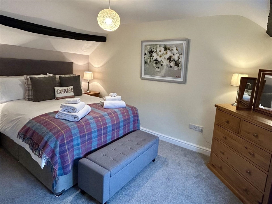 Cariad (Welsh for love) has a very comfy bed and equally good en-suite shower room