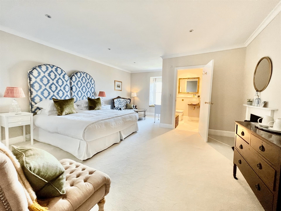 Large Room with super king / twin bed with a sofa and window seat sea view over looking Cardigan Bay. Bathroom has walk in 1.6m shower. Antiques are m