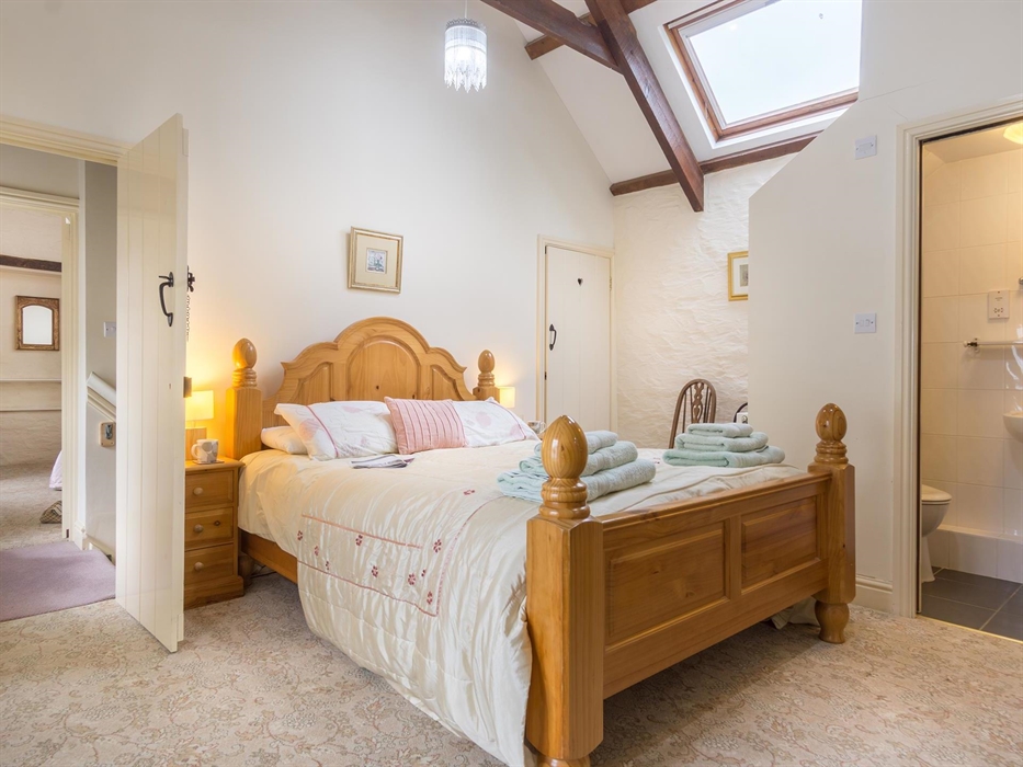 Bedroom 4 with king size bed and en-suite