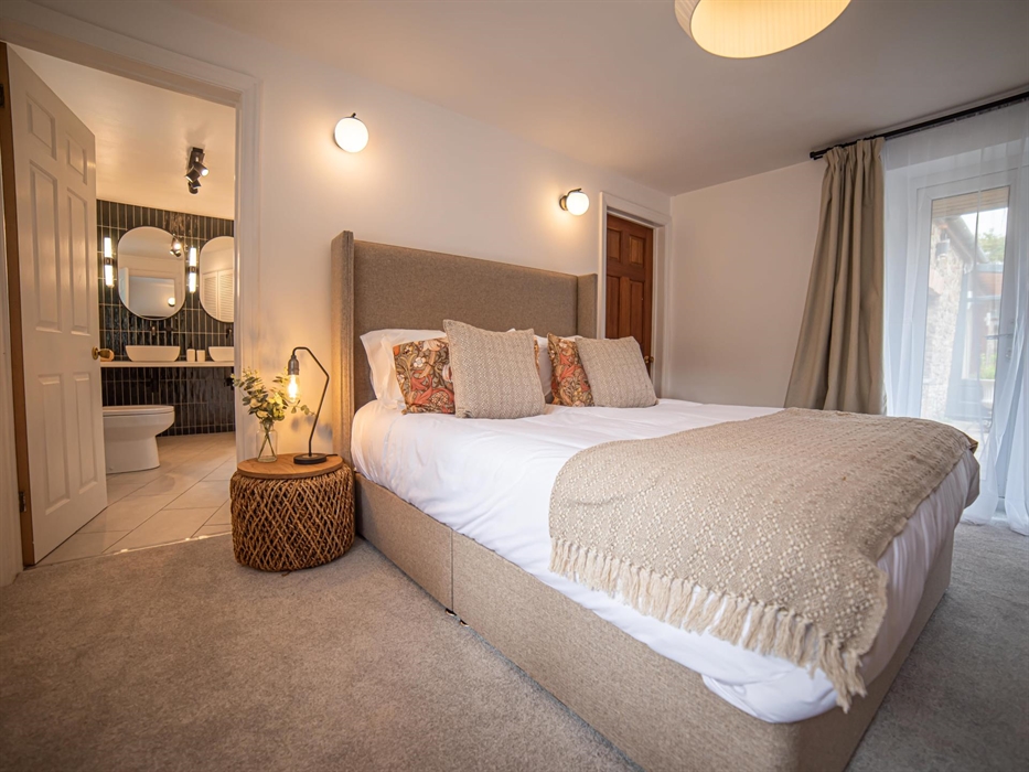 Dive into comfort in bedrooms adorned with exquisite decor, reflecting a blend of luxury and homely charm.