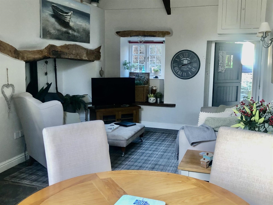 Comfortable dinning area leads onto the kitchen .