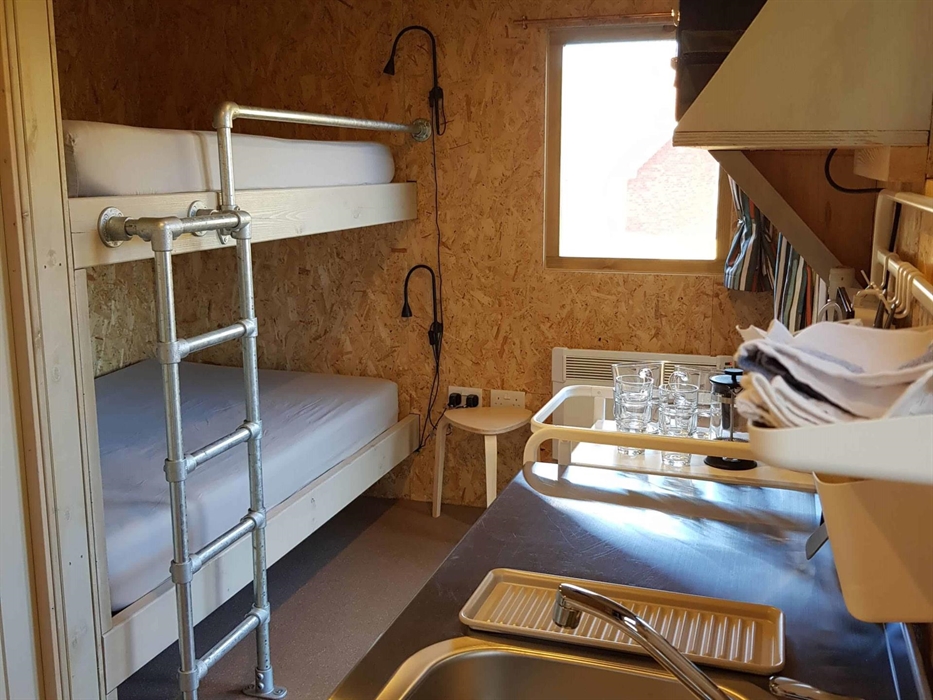 cabin bunk beds with kitchen facilities
