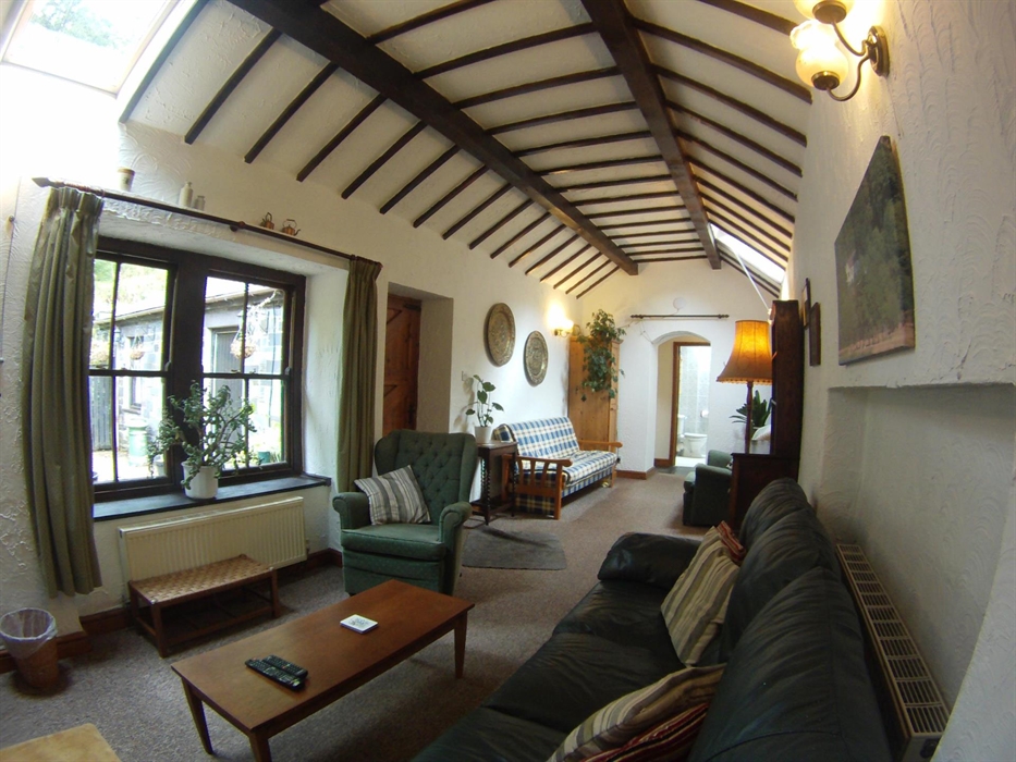 Large lounge with direct access to courtyard.