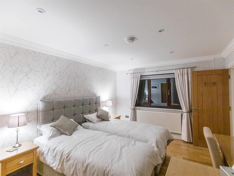 This is one of the two bedrooms. The king size beds can be arranged as two single beds as you can see here.
