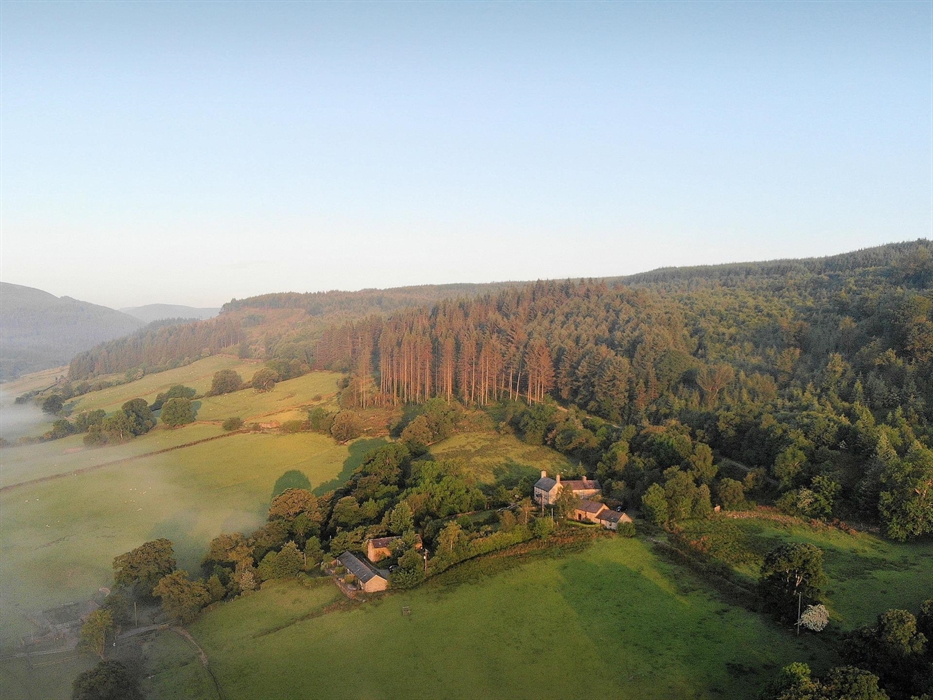 A picture of Benar Cottages in Penmachno taken from the air