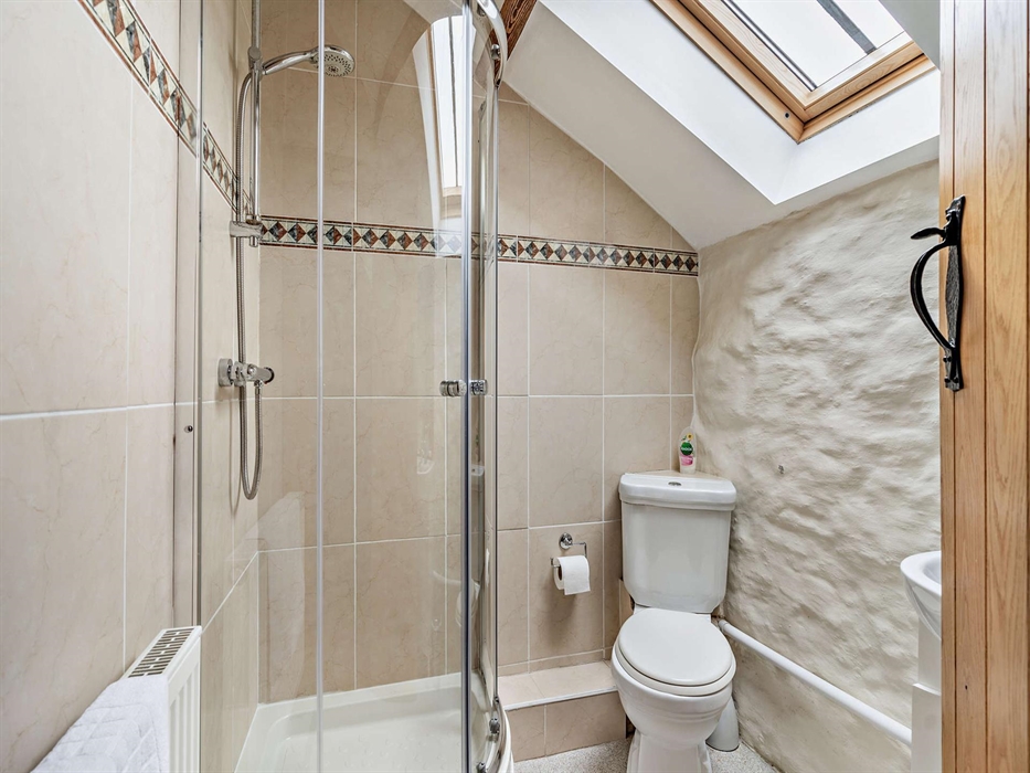 Room 5, sleeps 1 with a single bed & a shower en-suite