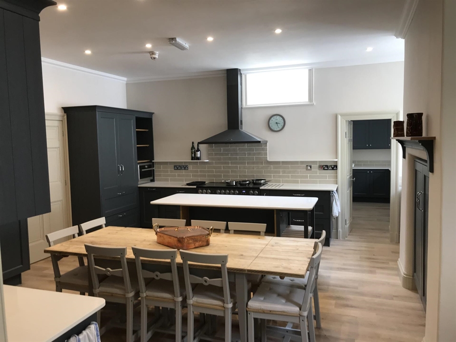 The large kitchen at Plas Bodegroes has a full range of modern equipment and kitchen table seating up to ten. A separate cool pantry is ideal for stor