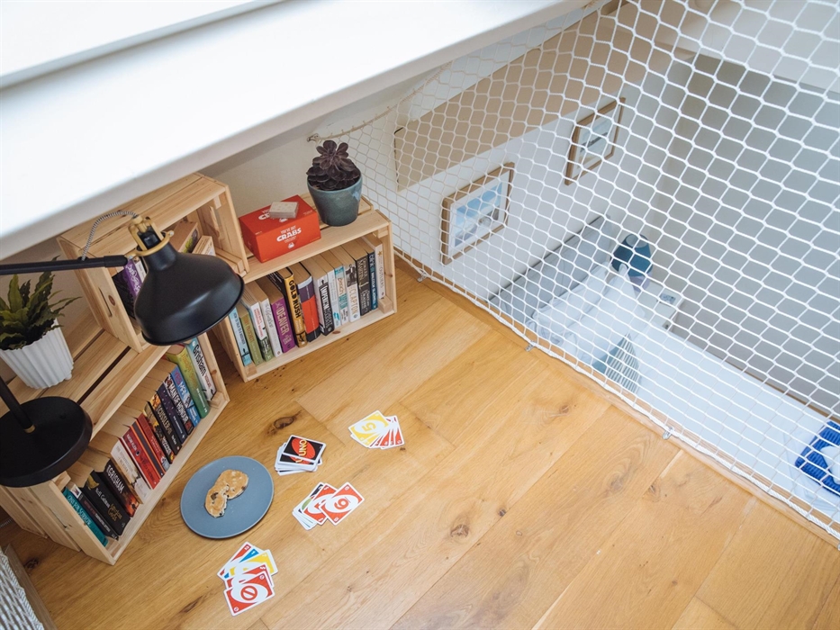 The Mezzanine looking down onto the master bedroom