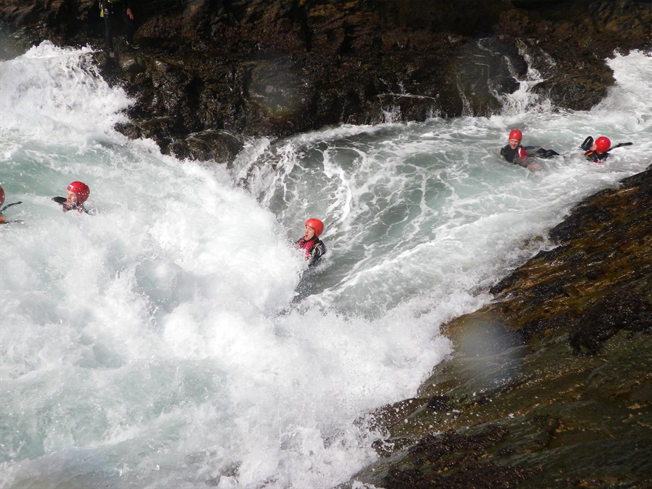 Experience the raw power of the ocean with Celtic Quest Coasteering, Pembrokeshire West Wales. Toilet Flushing is a popular water feature, jump in and