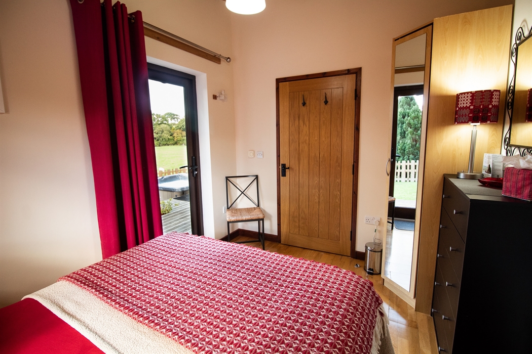 Ash and Sycamore double bedroom with access out on veranda.