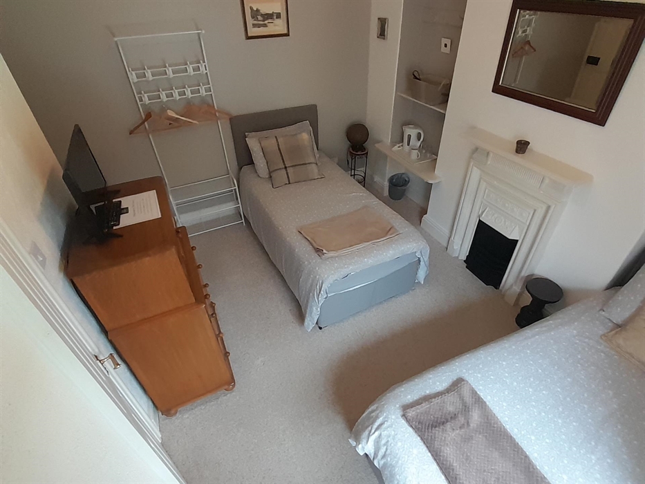 Twin bedroom with ensuite shower room.