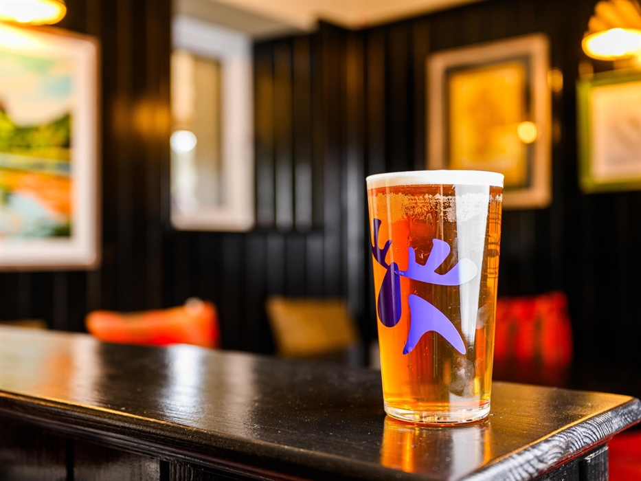 A fully stocked bar with local beer and spirits
