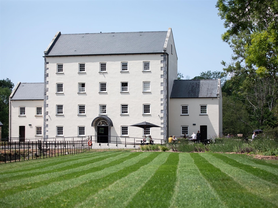 An image of Black Pool Mill during the summer.