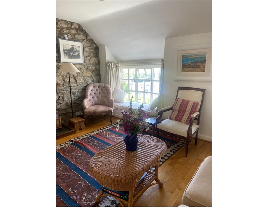 The cosy sitting room - with woodburner