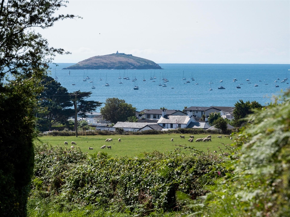 View of the sea from Gwel Y Mor featuring an island and boats on the sea