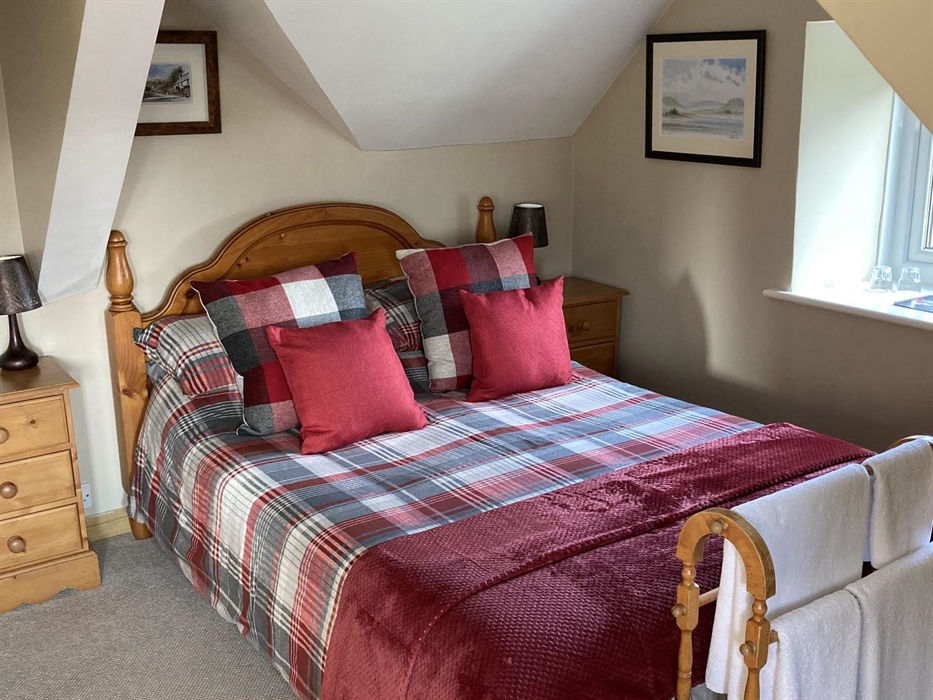 A double room for 2, ensuite shower.  Over looking the lake at the front and to the side the land that Llwyn Onn sits on.