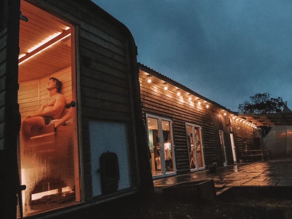 Bask in the comforting embrace of warmth at Logi Saunas, as the golden glow envelops you in a cocoon of relaxation and tranquility.