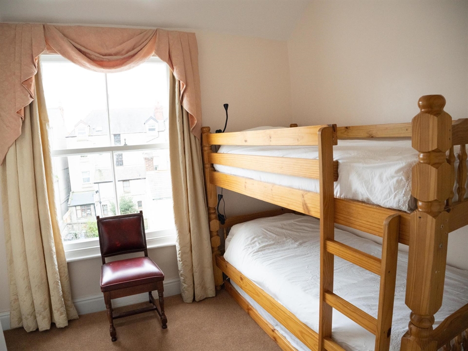 This beautiful small bunk bedroom is on the 2nd floor.  The en-suite is a shower/wc room with heritage style sink.  There is complimentary beverages i