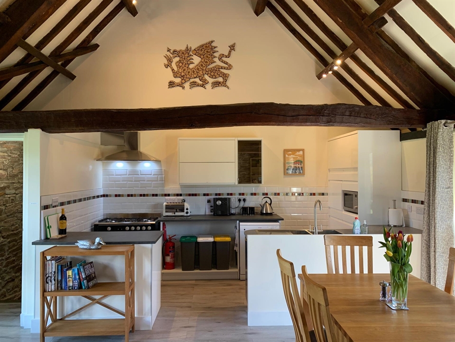The Longhouse at Hilltops Brecon Holiday Cottages has a fully equipped kitchen, gas cooker and hob, microwave, fridge, freezer, Nespresso machine and