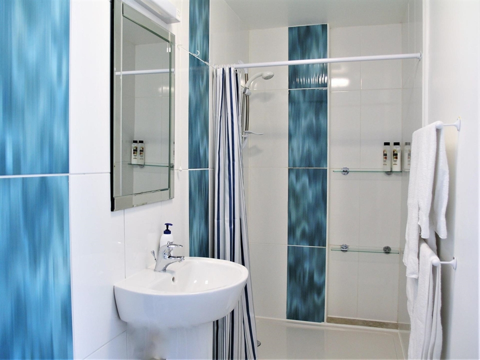 Level shower room for disabled use