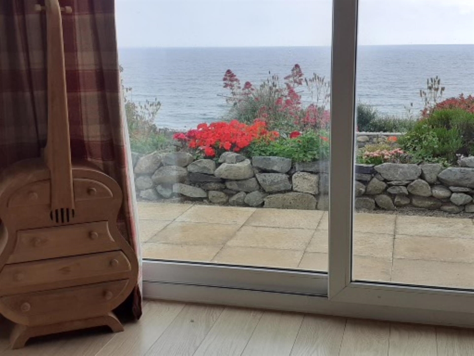 Watch out for passing porpoises and yachts from the comfort of your settee!