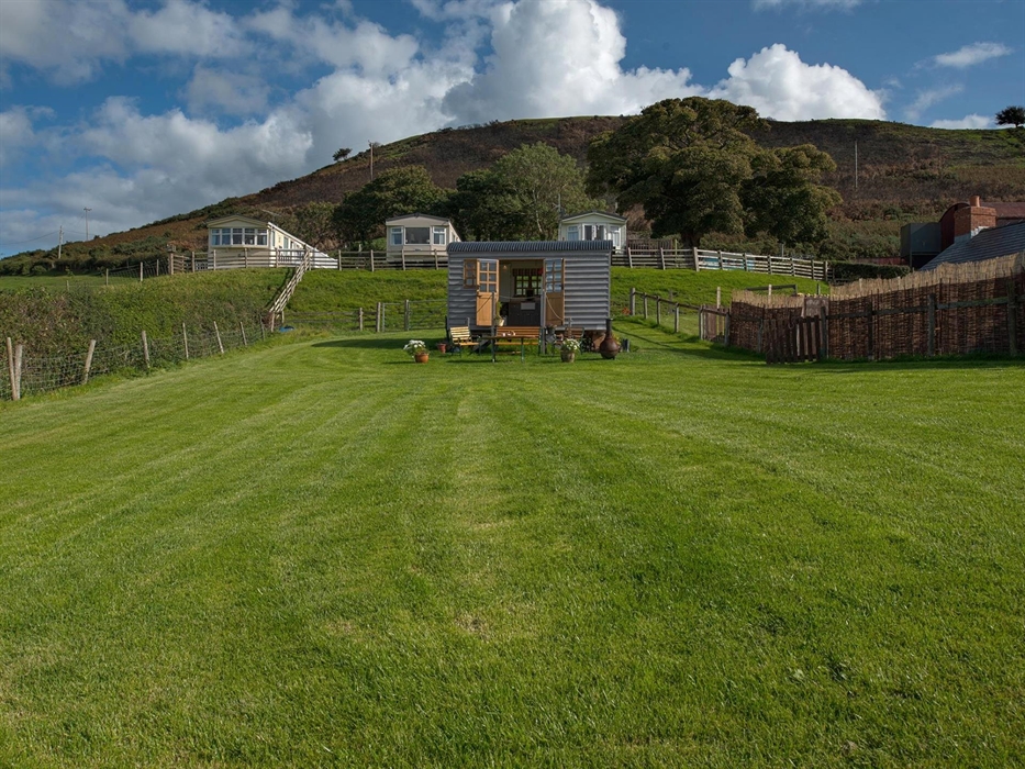 This shows the size of the paddock.  There are 3 caravans only behind which are privately owned.  It is possible to walk up the hill in the background