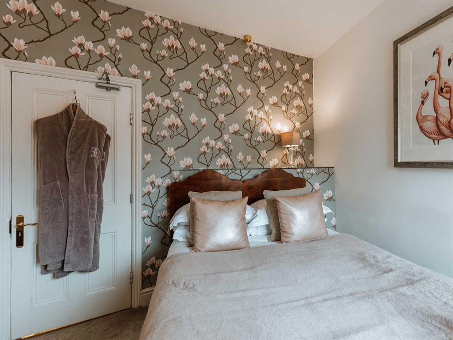 Bedroom One is a smaller double or very spacious single room. It is on the first floor and looks out onto the courtyard – especially gorgeous when the