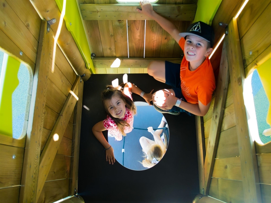 Our play area is home to tall tower and there's lots of excitement when climbing through it.