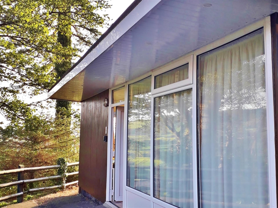 Sea Moss Cabin has no steps and is completely accessible from the Car Park. The window frontage allows sunlight to flood in, and affords views across