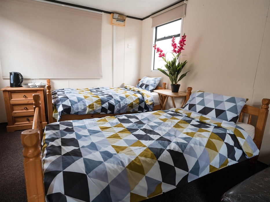 We also have several private cabins with two end bedrooms, which can sleep up to four persons. They have their own shower and toilet, so ideal for sta