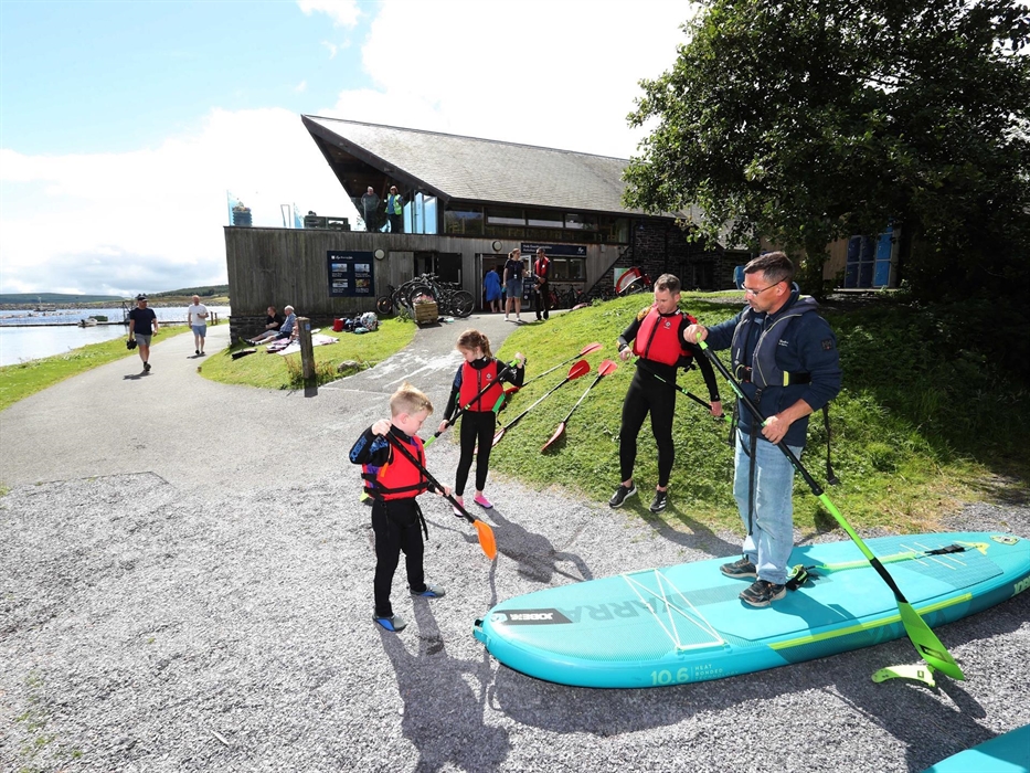 Getting ready for paddle boarding at Llyn Brenig