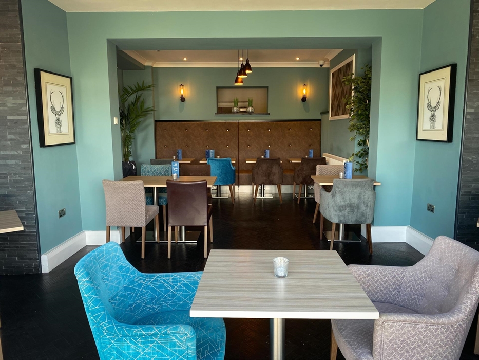 Relax in style with soft tones, cozy seating, and a warm, modern vibe. Perfect for any occasion.