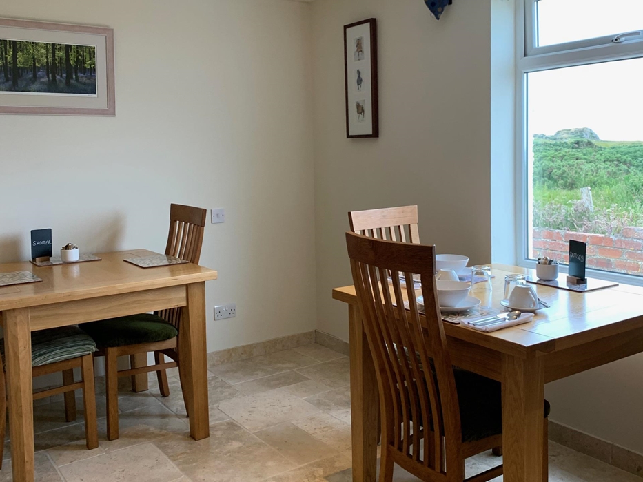 A bright room, where guests can enjoy a continental breakfast.
