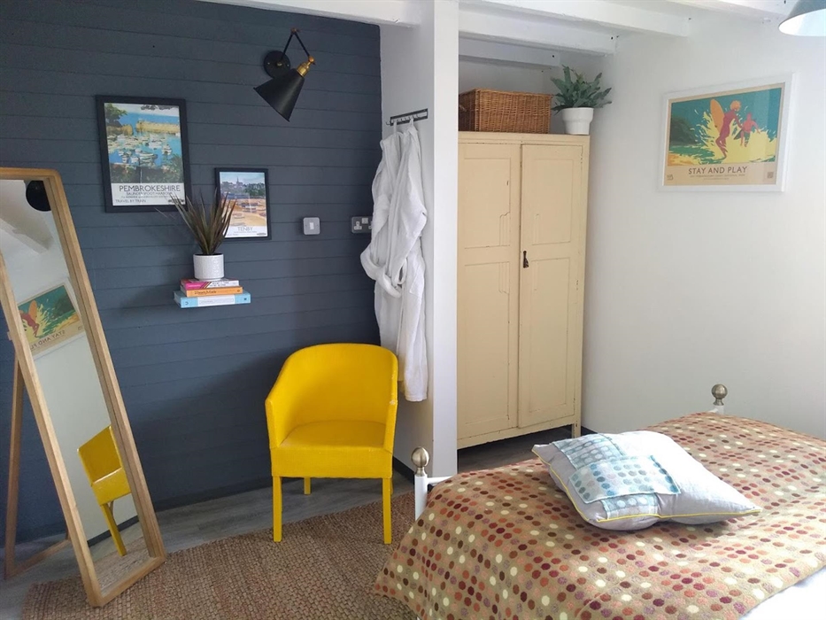 Milking Shed's bright and spacious bedroom.