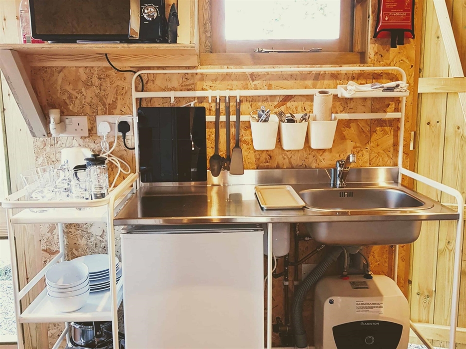 cabin kitchen facilities fridge, microwave, kettle, hob, crockery, pots, pans