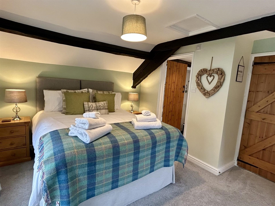 Cwtch (Welsh for cuddle) up in the super comfy king size bed.