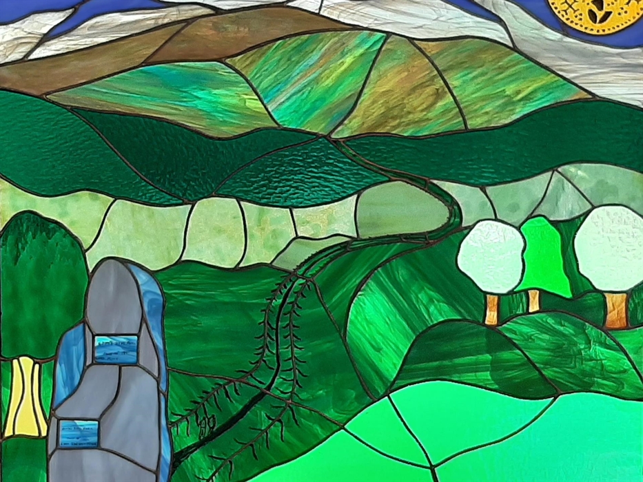 Our stained glass window by artist Stephen Bradley
