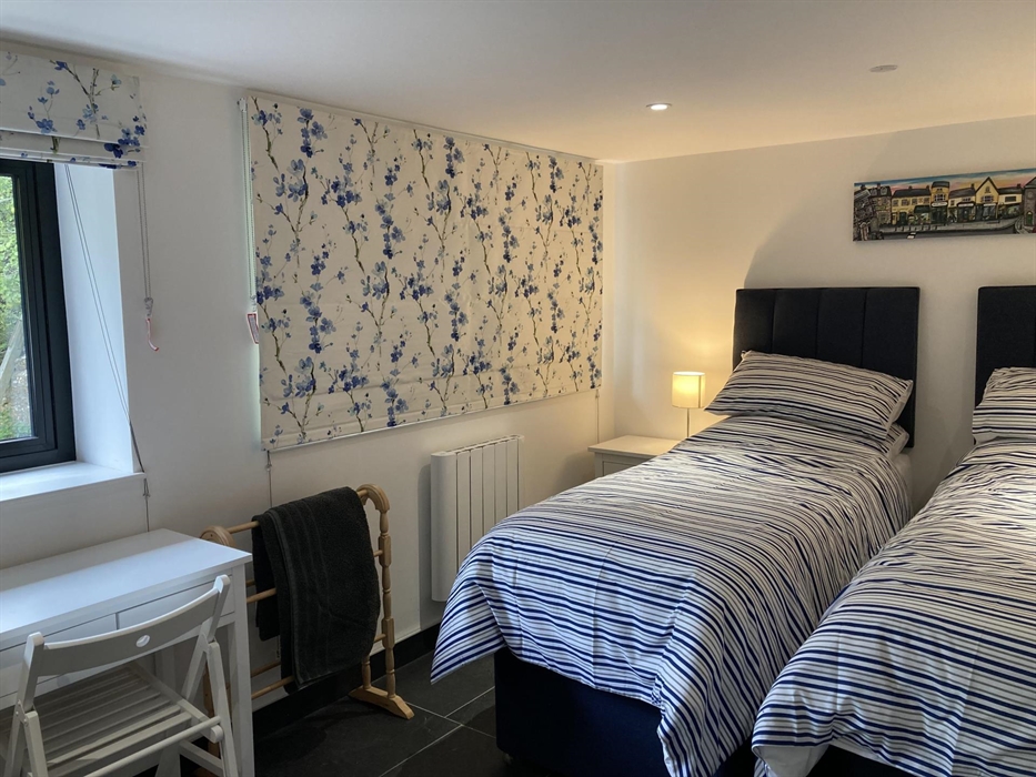 This room can be configured as a king size or twin beds.