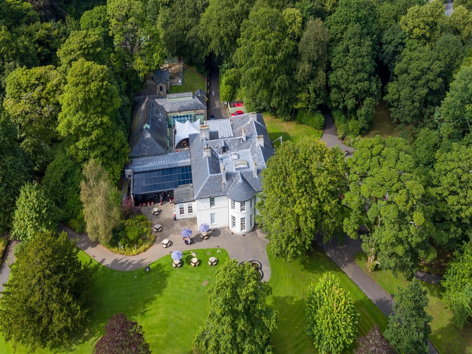 An aerial shot of Bedwellty House featuring the cafe and people enjoying refreshments from the cafe.