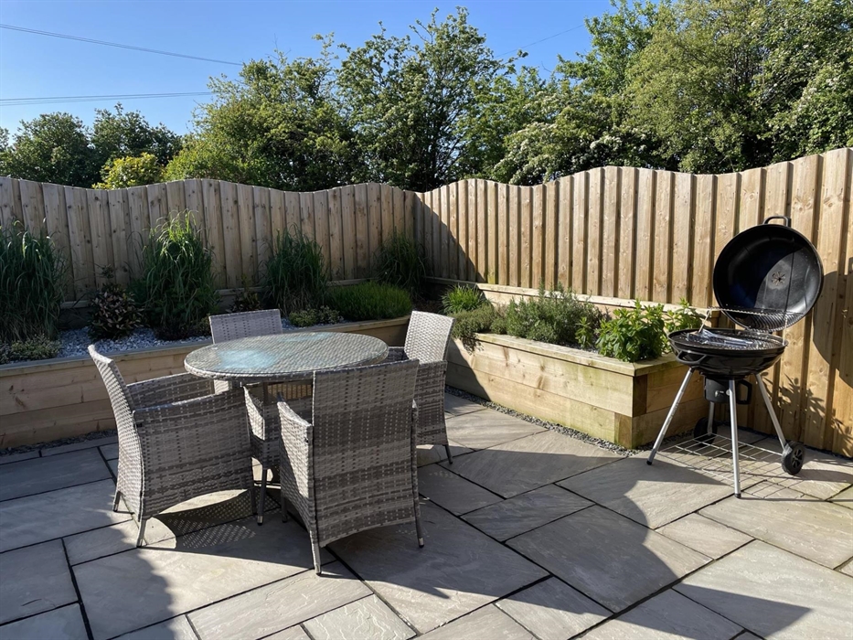 accessed from the lounge, fully enclosed private patio garden with BBQ