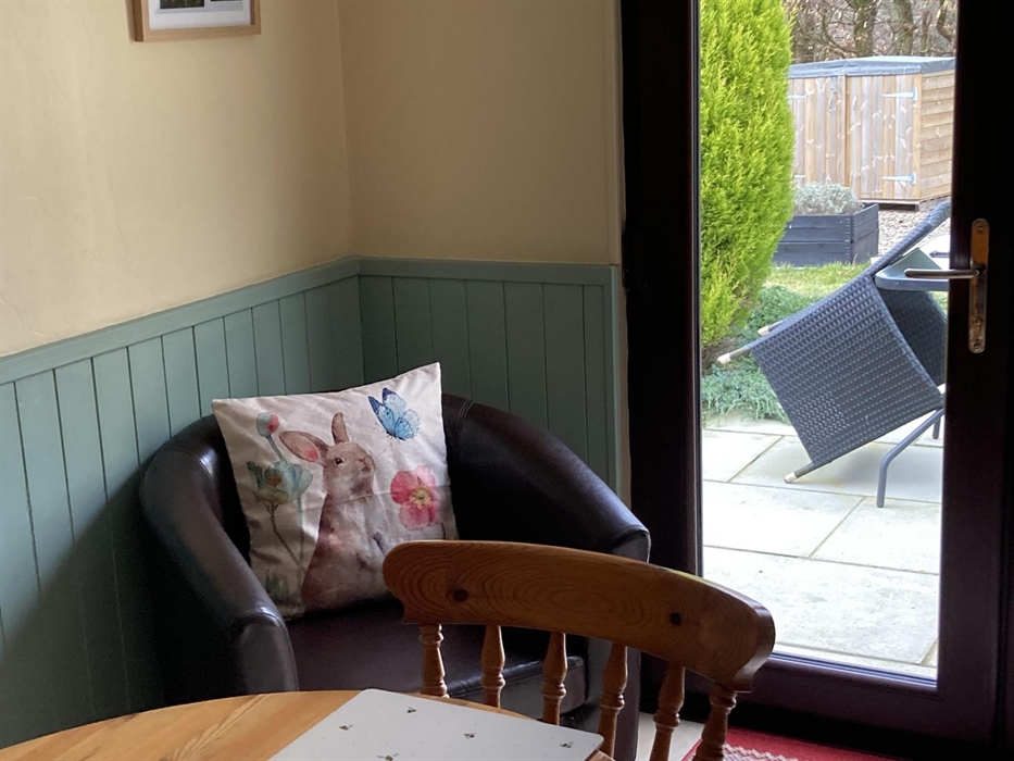 Overlooking the patio, this bucket chair is the ideal place to watch the birds enjoying food from the feeders