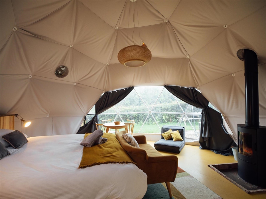 Each dome has a wood burner and infrared heater to keep you warm all year round .. they each have their own private garden, bathroom and kitchen