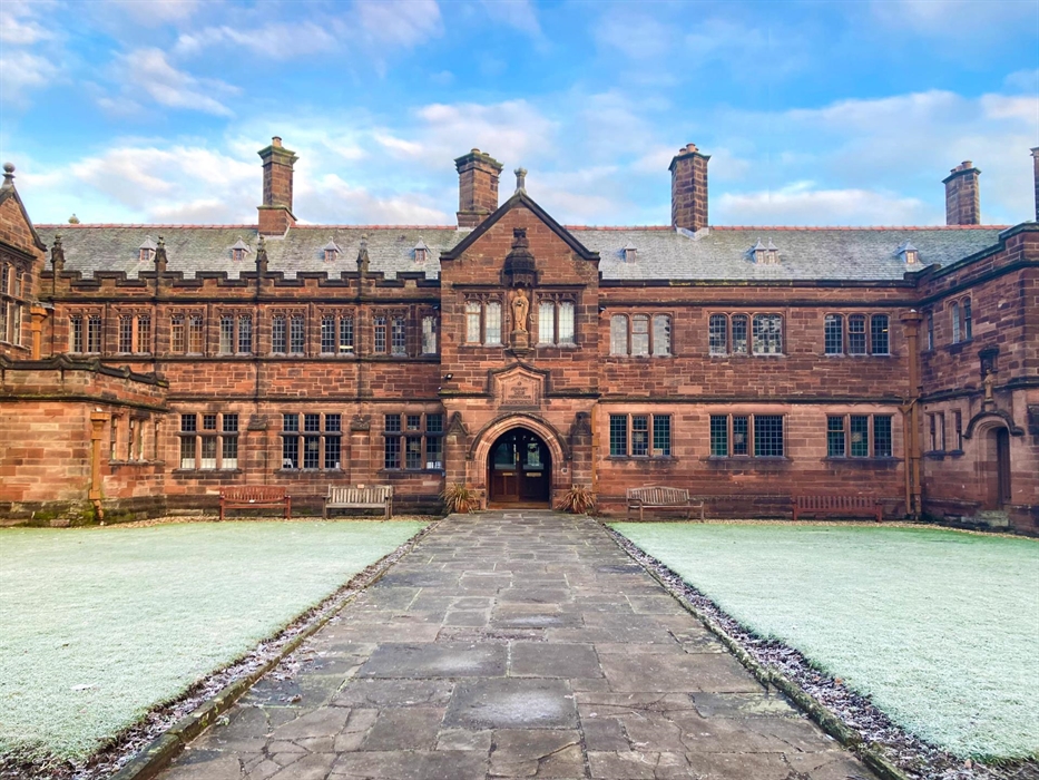 The front exterior of Gladstone's Library, a late 19th and early 20th Century neo Gothic building constructed from sandstone.